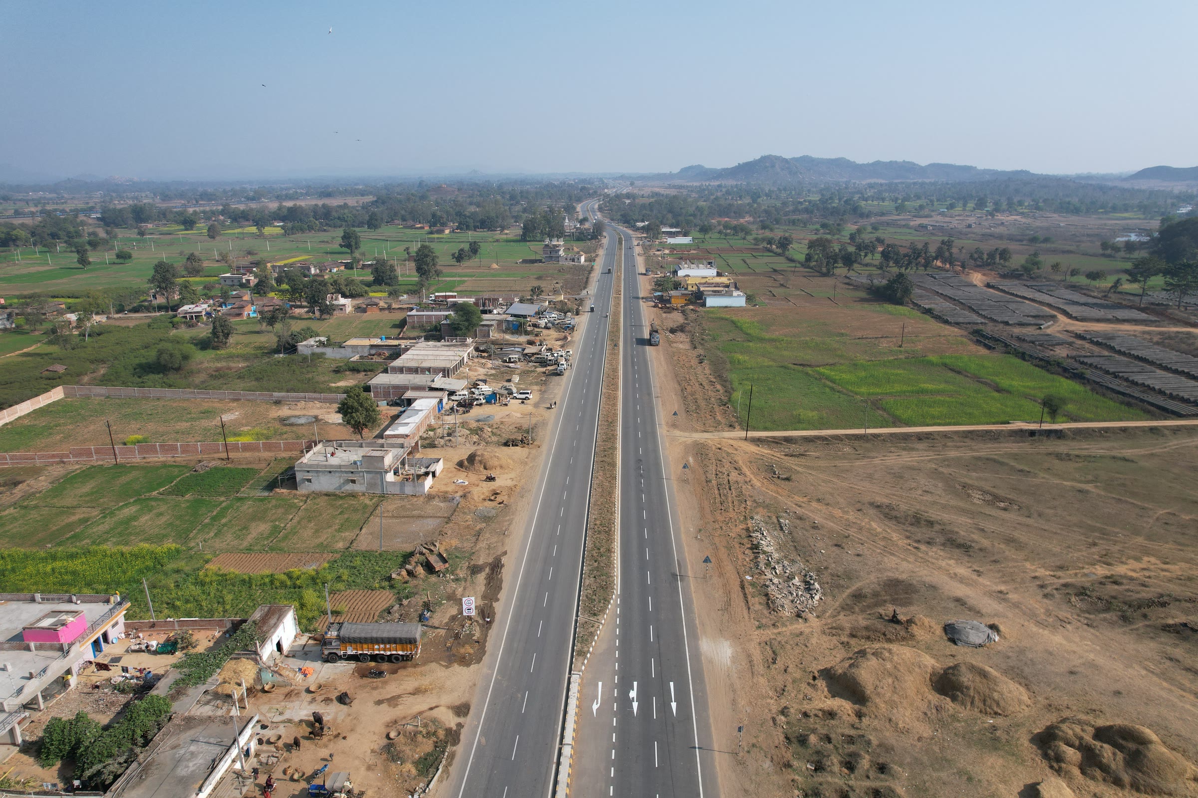 Two-lane asphalt road from above