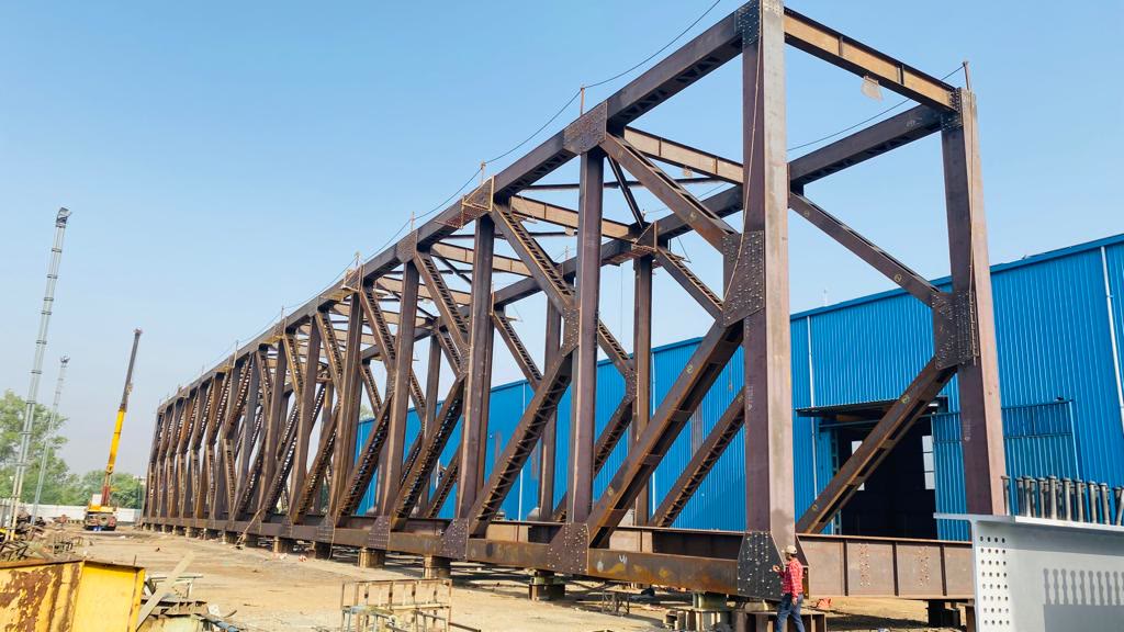 Open web truss span at site